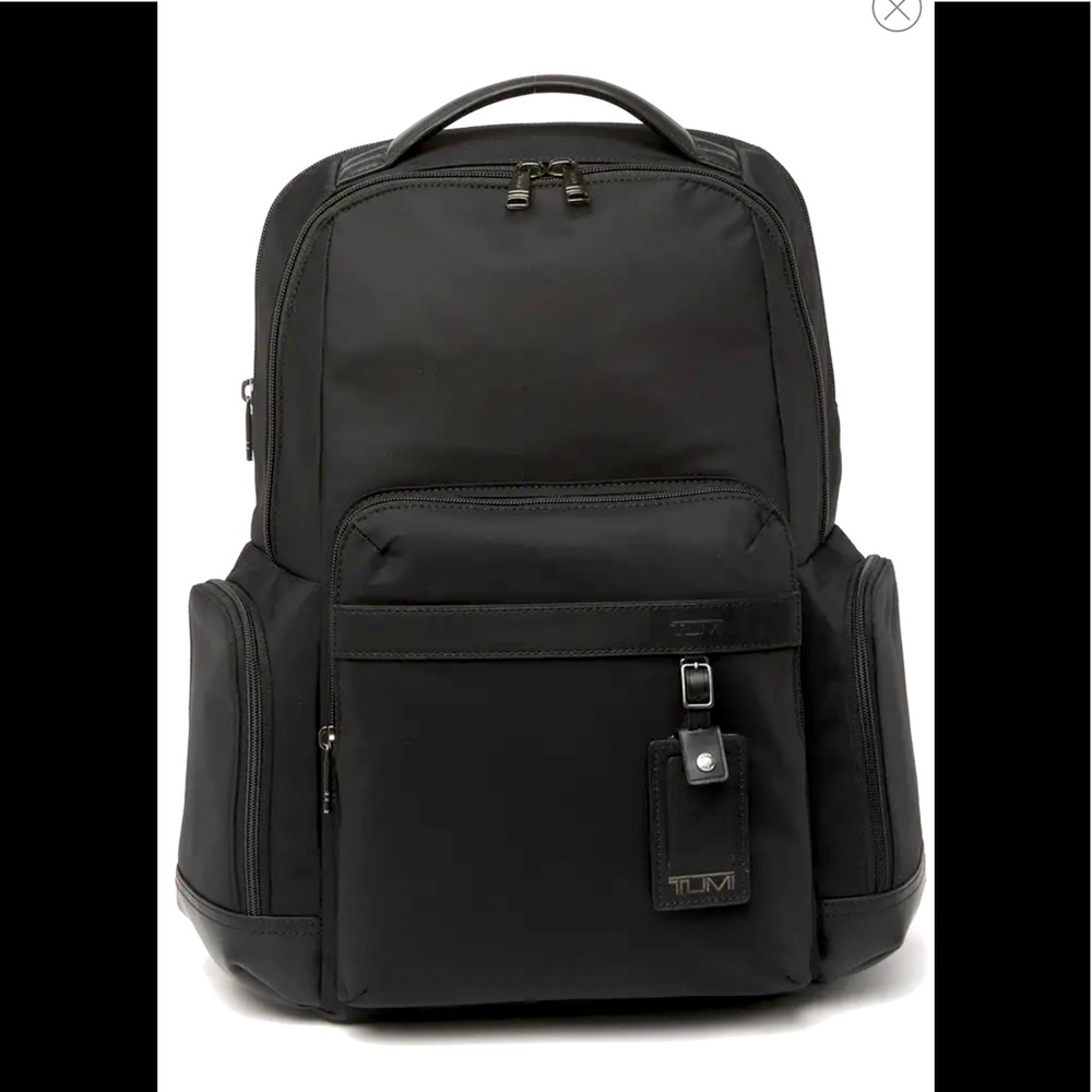 Tumi (Fredrick) black backpack.New with tags.